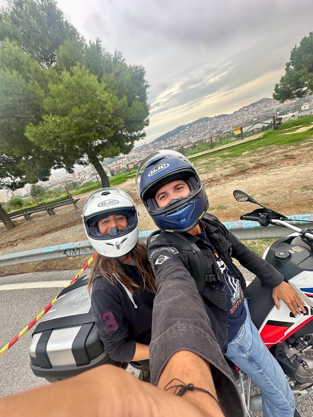 Meli with her guide at a viewpoint over Barcelona