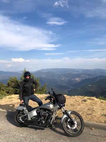 Rider above the valley at Montferrer i Castellbo in the Catalan Pyrenees