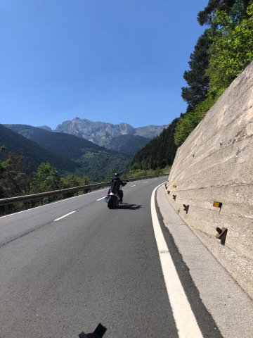 Pyrenean road cut into the hillside near Baqueira Beret