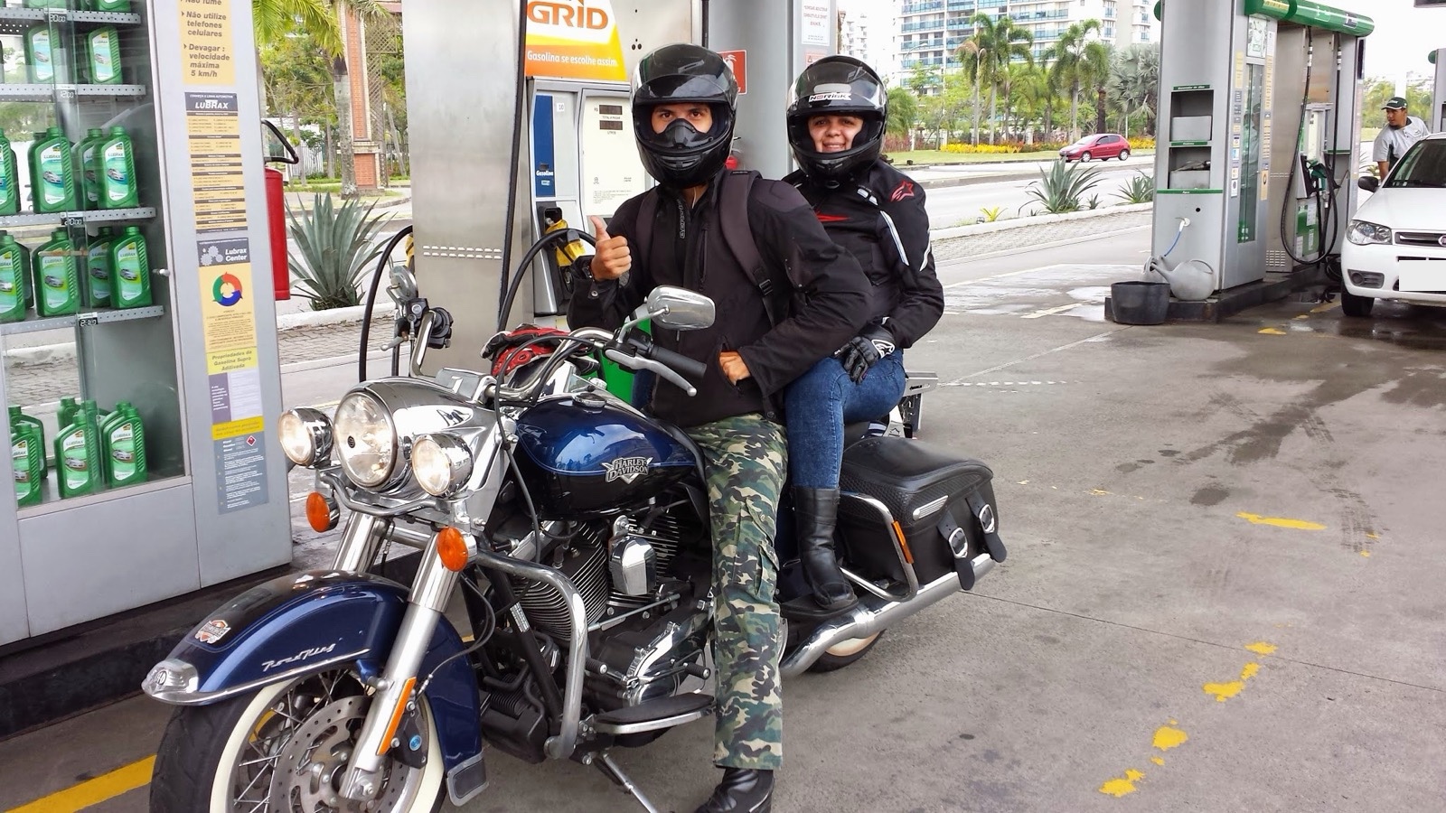 Pilot and passenger on a Harley-Davidson, ready to ride